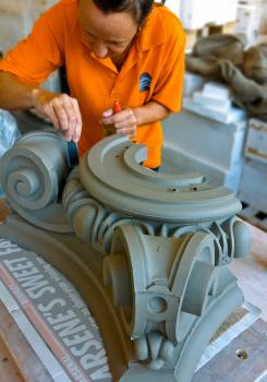 1) At Darwen Terracotta: skilled hand finishing of an ornate terracotta block destined for a building restoration project